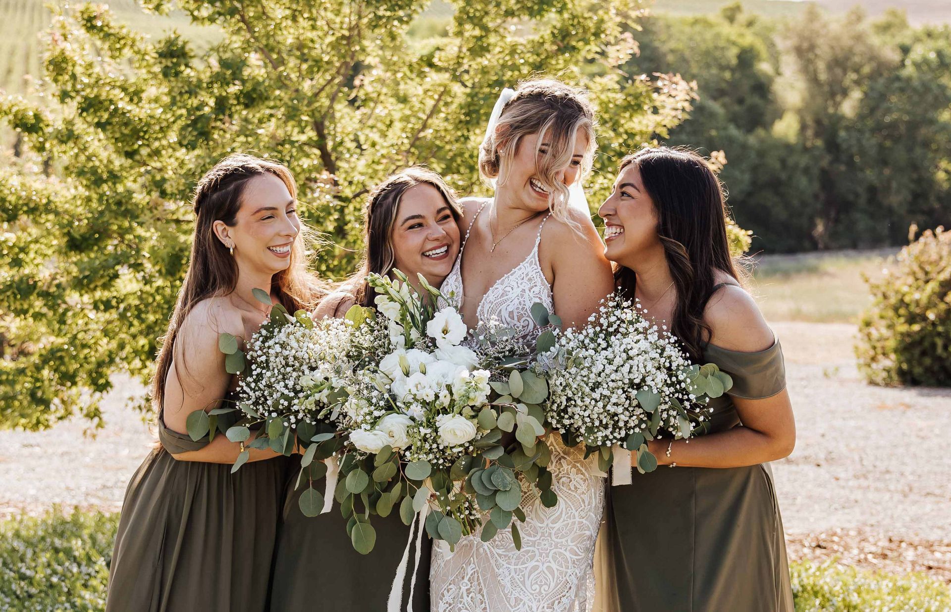 a bride and her bridesmaids are posing for a picture