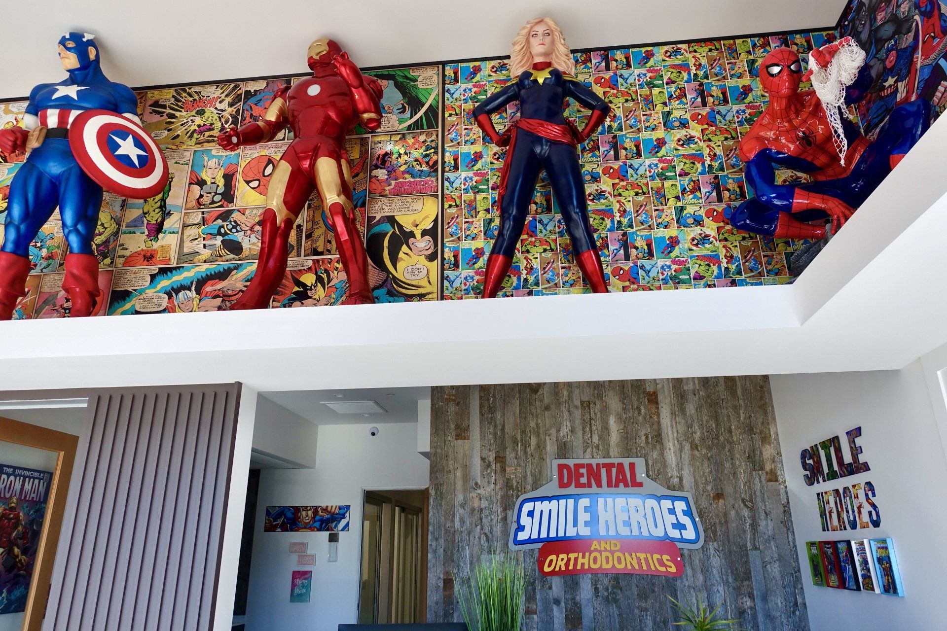 Smile Heroes of Sun Valley with a lot of superhero figures on the wall