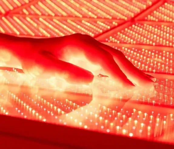 Flow Lightstim, hand on led bed