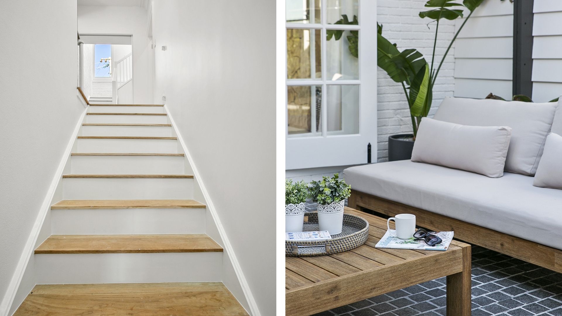 A staircase next to a couch and a coffee table.