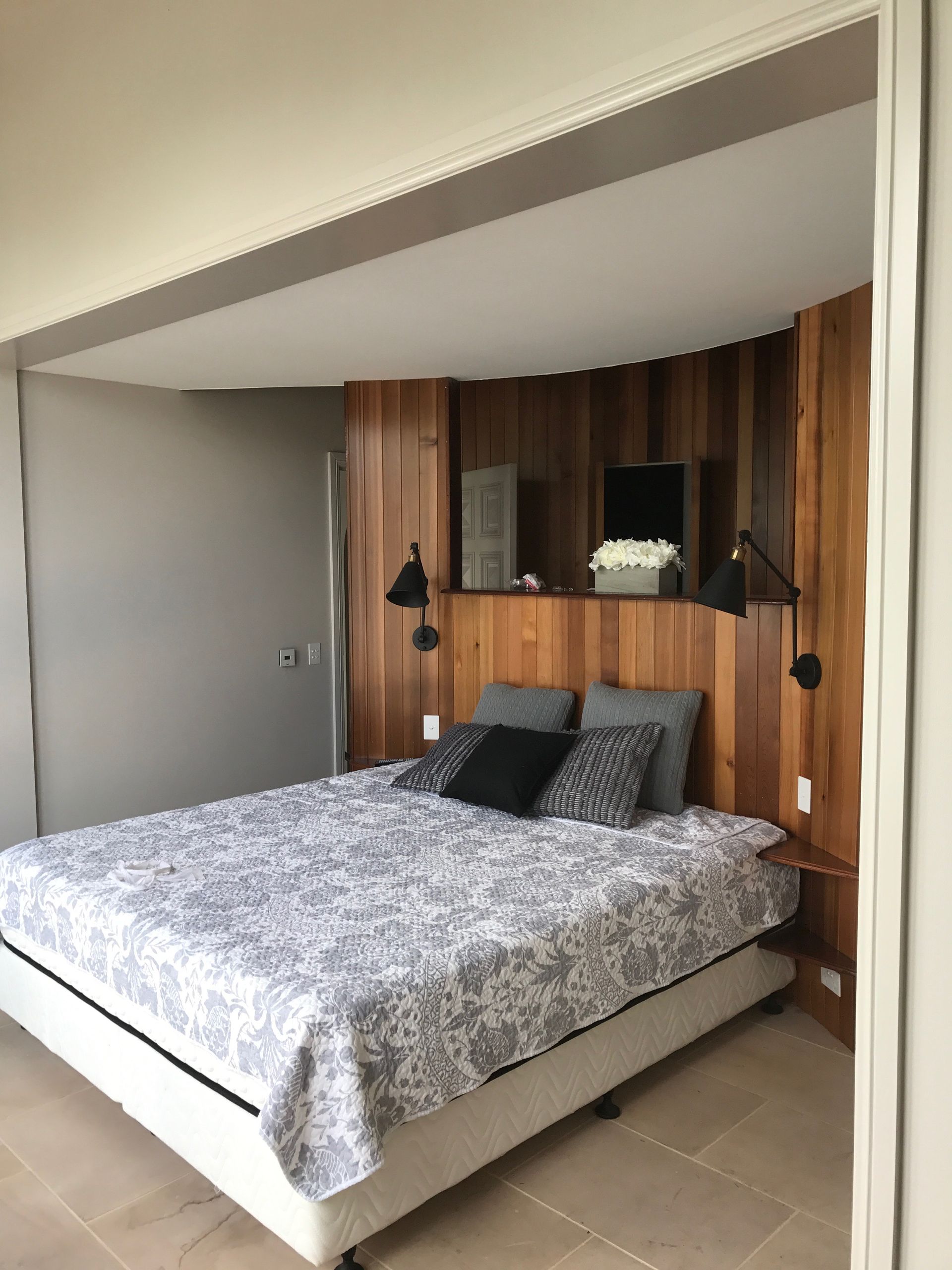 There is a large bed in the middle of the room.