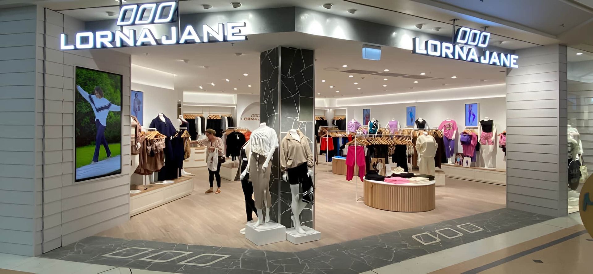 A Lorna Jane Store With Mannequins In Front Of It — Chris Hickling Electrical In Port Macquarie, NSW