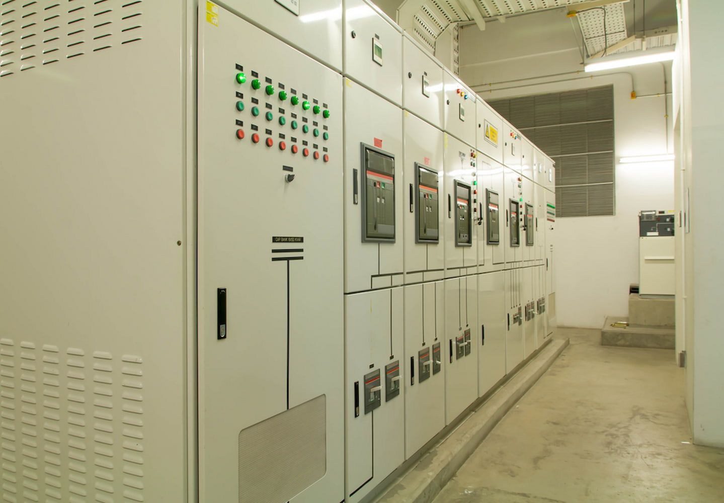 A Row Of Electrical Cabinets Are Lined Up In A Room — Chris Hickling Electrical In Port Macquarie, NSW