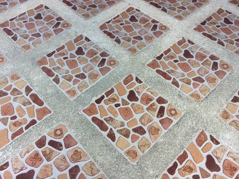 A Close Up Of A Tiled Floor With A Brick Pattern  — Floorgard in Wamberal, NSW