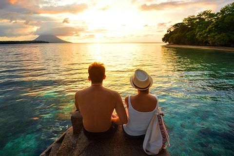 Couple watching the sunset — Caribbean Destinations in Manchester, NJ