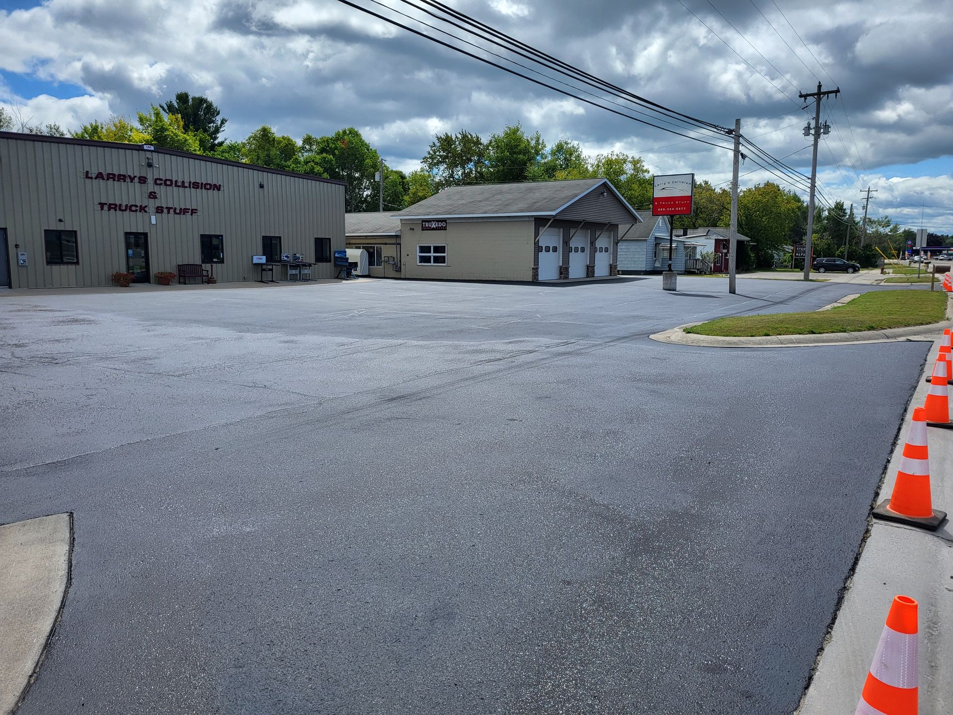 commercial parking lot in alpena michigan sealcoated by alpena asphalt armor llc
