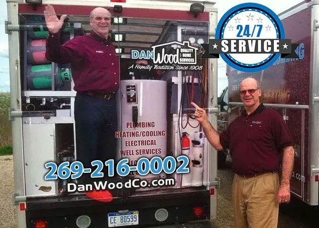 Owner Beside The Service Truck — Portage, MI — Dan Wood Company