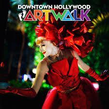 A woman in a pink bikini is floating on her back in the water.