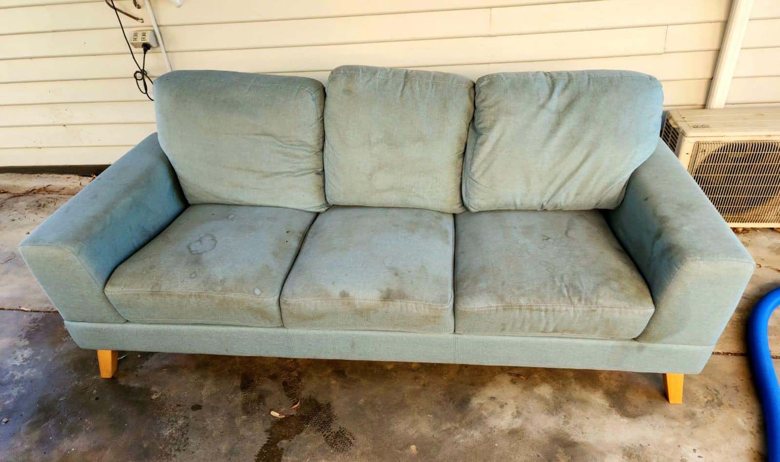 Photo of blue couch before professional cleaning by Advanced Floor care, Bendigo.