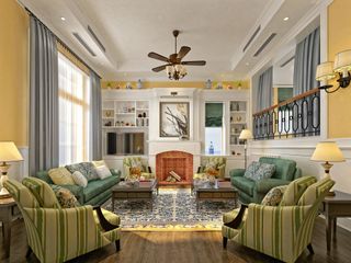 A living room filled with furniture and a fireplace.