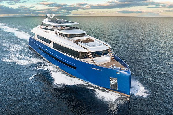 A large blue and white yacht is floating on top of a large body of water.