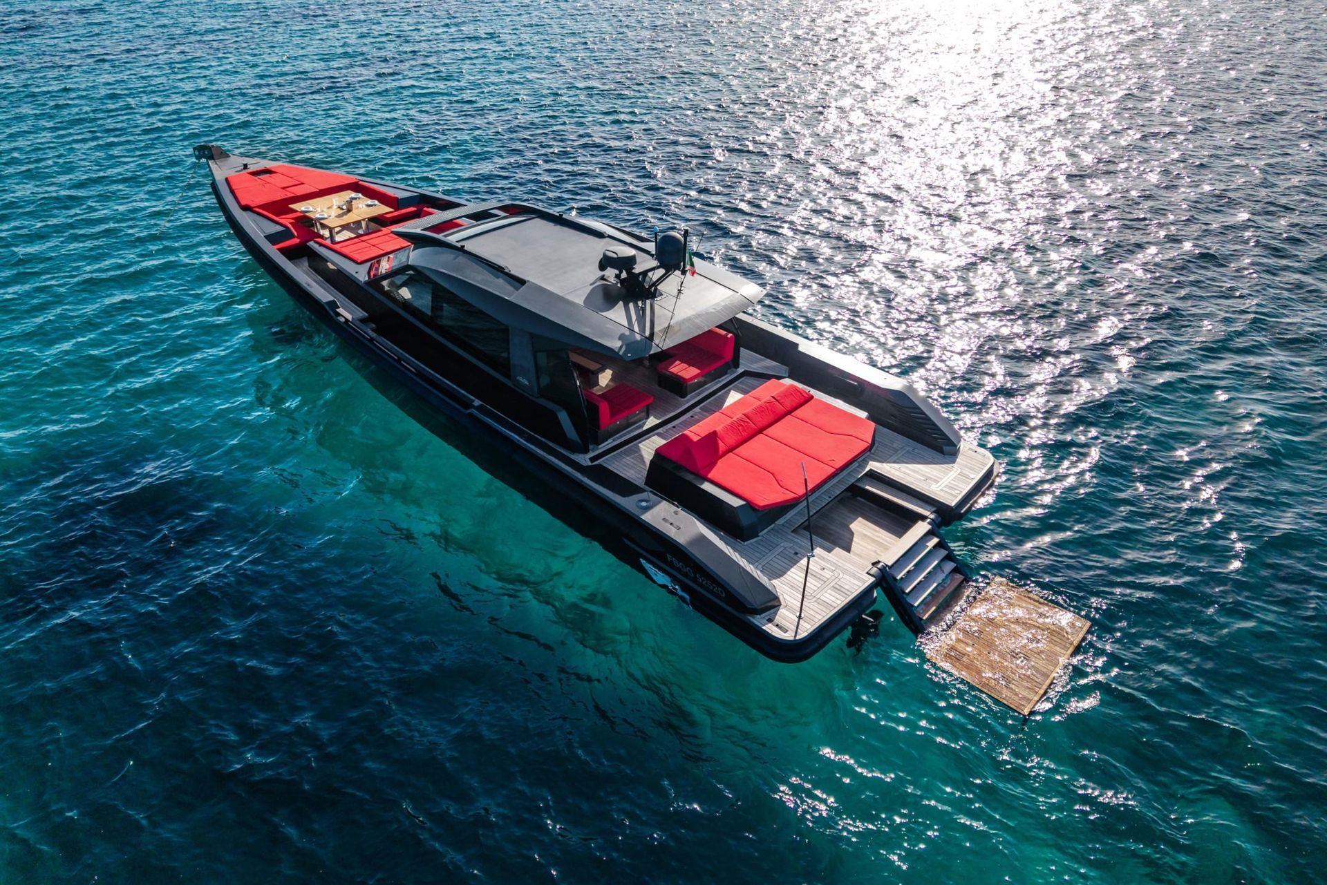 An aerial view of a boat in the ocean.