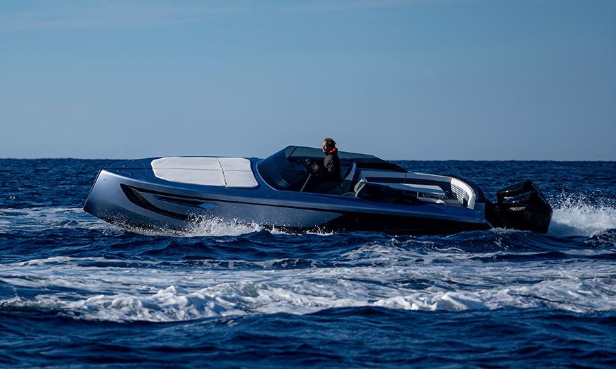 A boat is floating on top of a body of water.