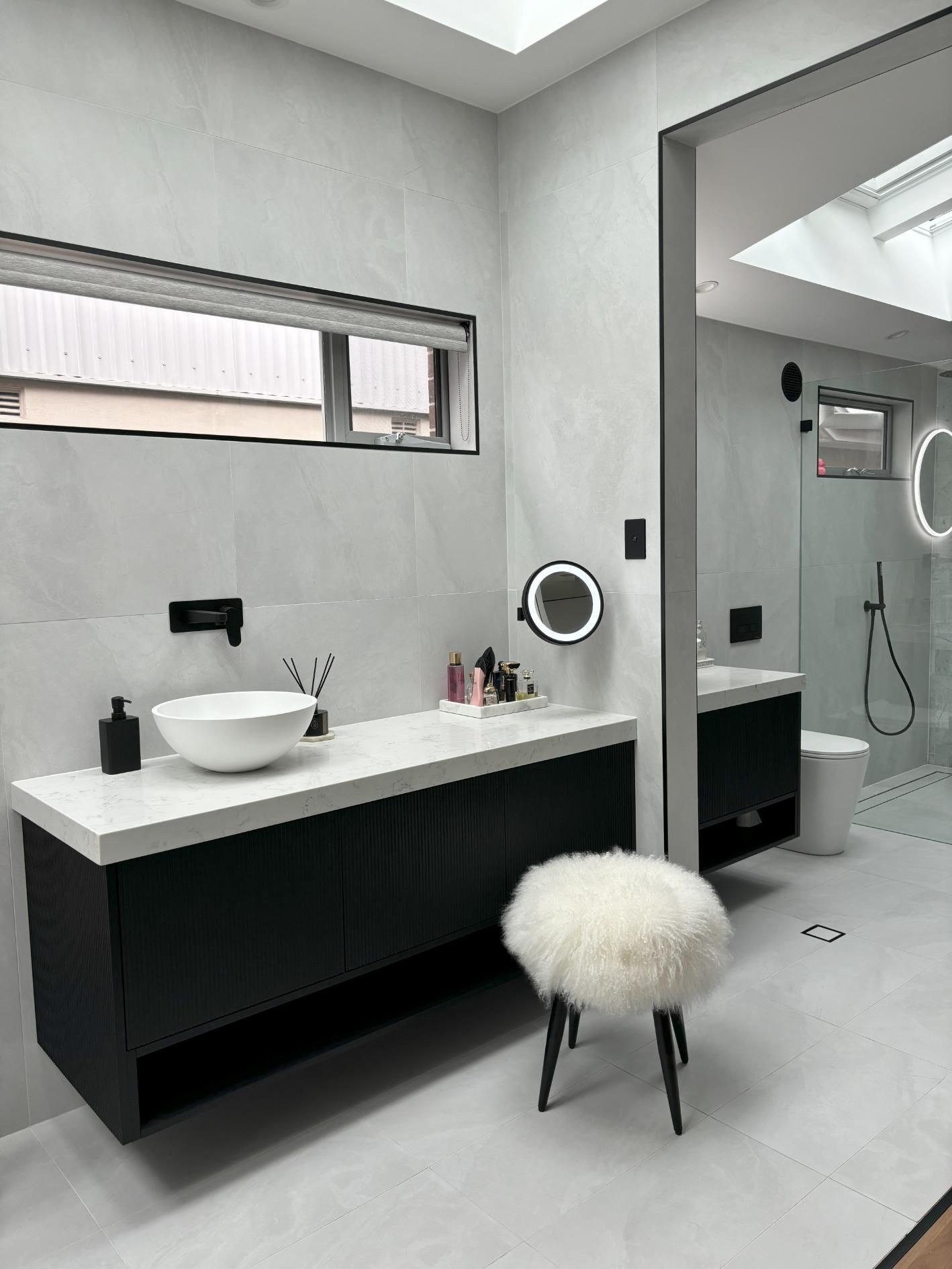 A Bathroom with A Sink, Mirror and Stool — Darko's Kitchens in Barrack Heights, NSW