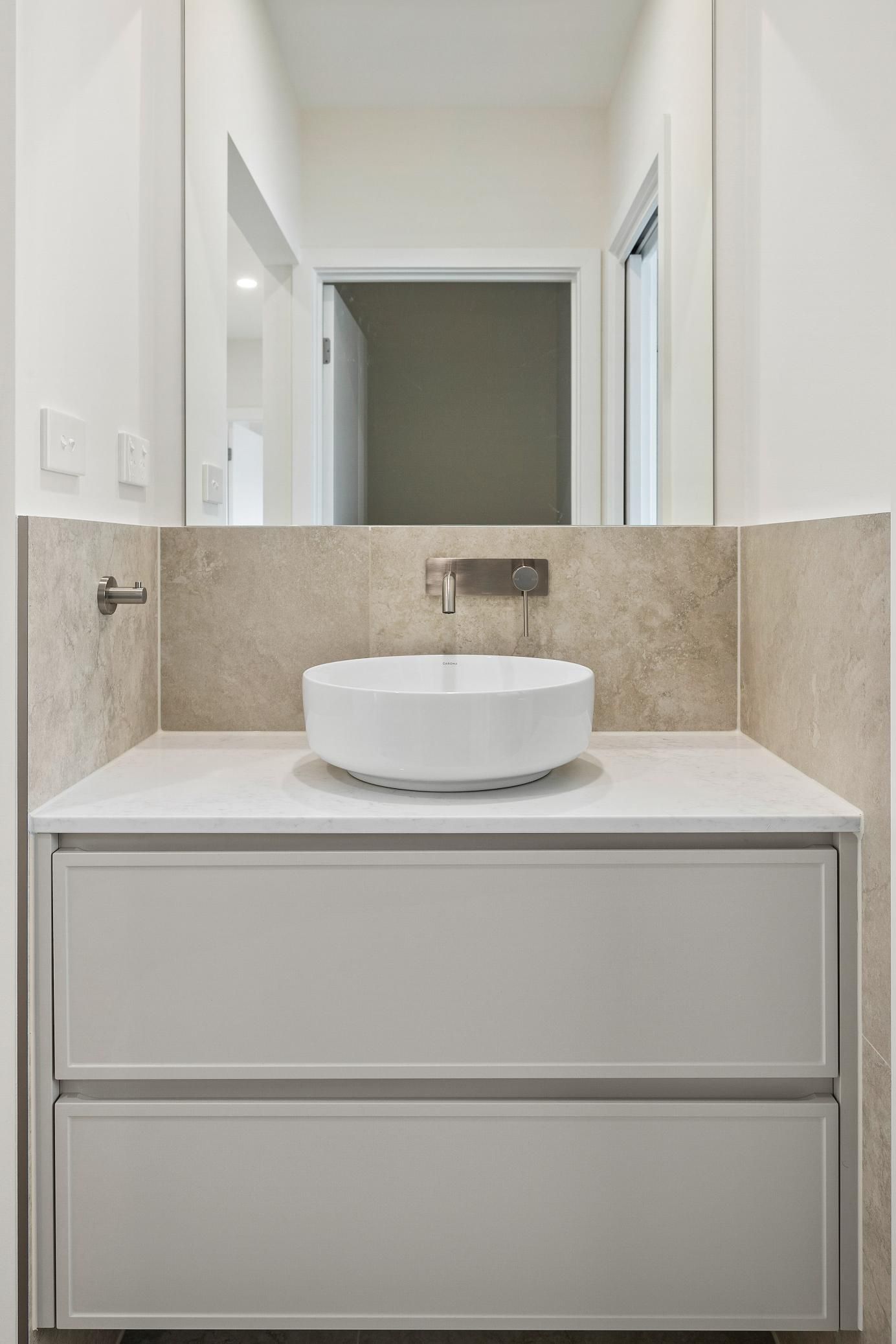 A Bathroom with A Sink , Mirror and Drawers — Darko's Kitchens in Horsely, NSW