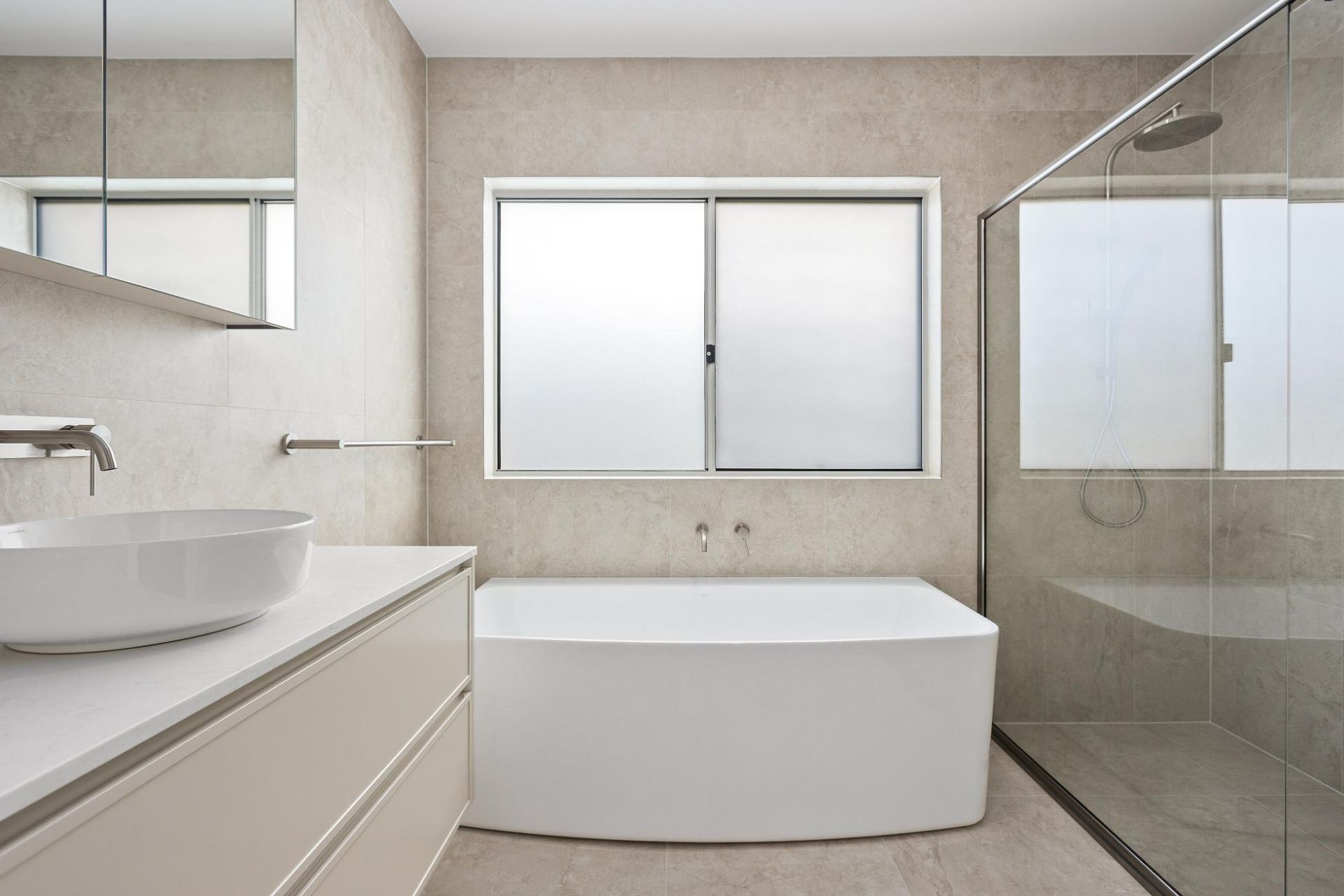 A Bathroom with A Bathtub, Sink, and Shower — Darko's Kitchens in Horsely, NSW