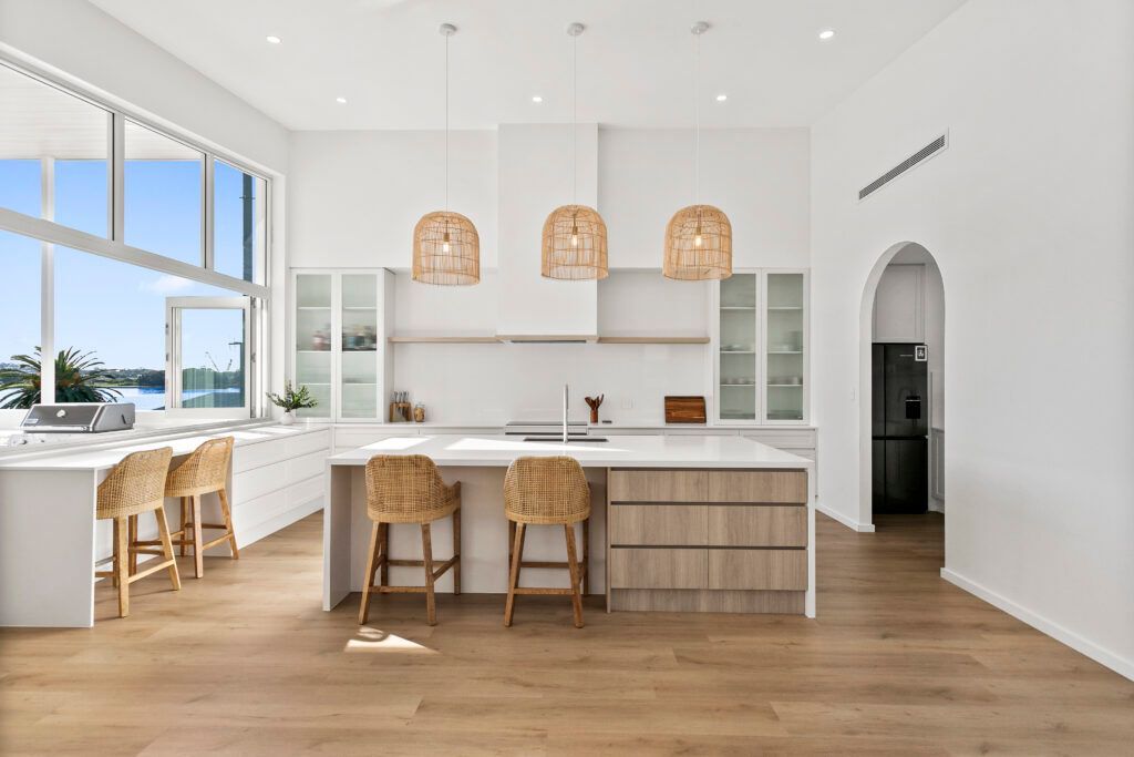 A Kitchen With a Sink , Refrigerator , and Shelves — Darko's Kitchens in Primbee, NSW