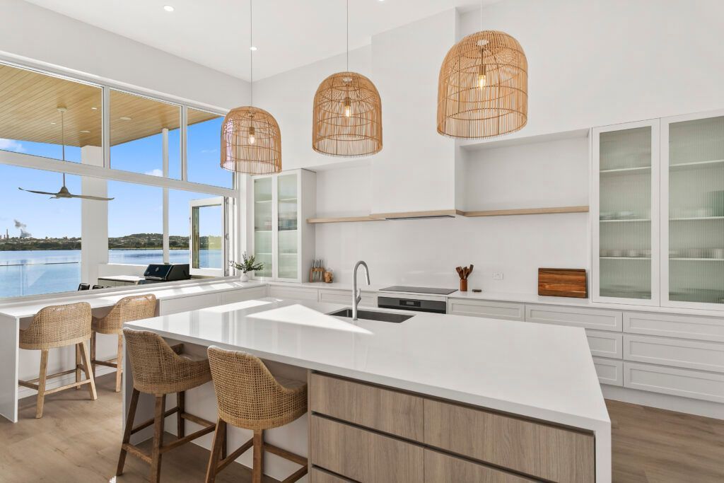 A Kitchen With a Sink , Refrigerator , and Shelves — Darko's Kitchens in Primbee, NSW