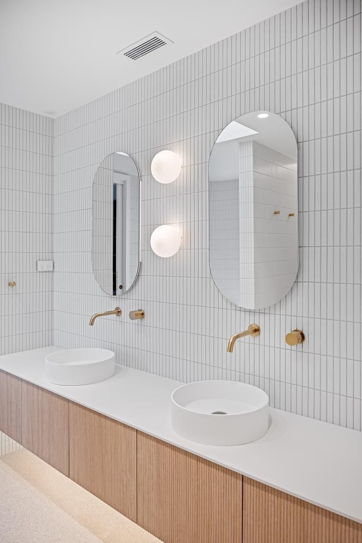 An Empty Living Room With Hardwood Floors— Darko's Kitchens in Woonona, NSW