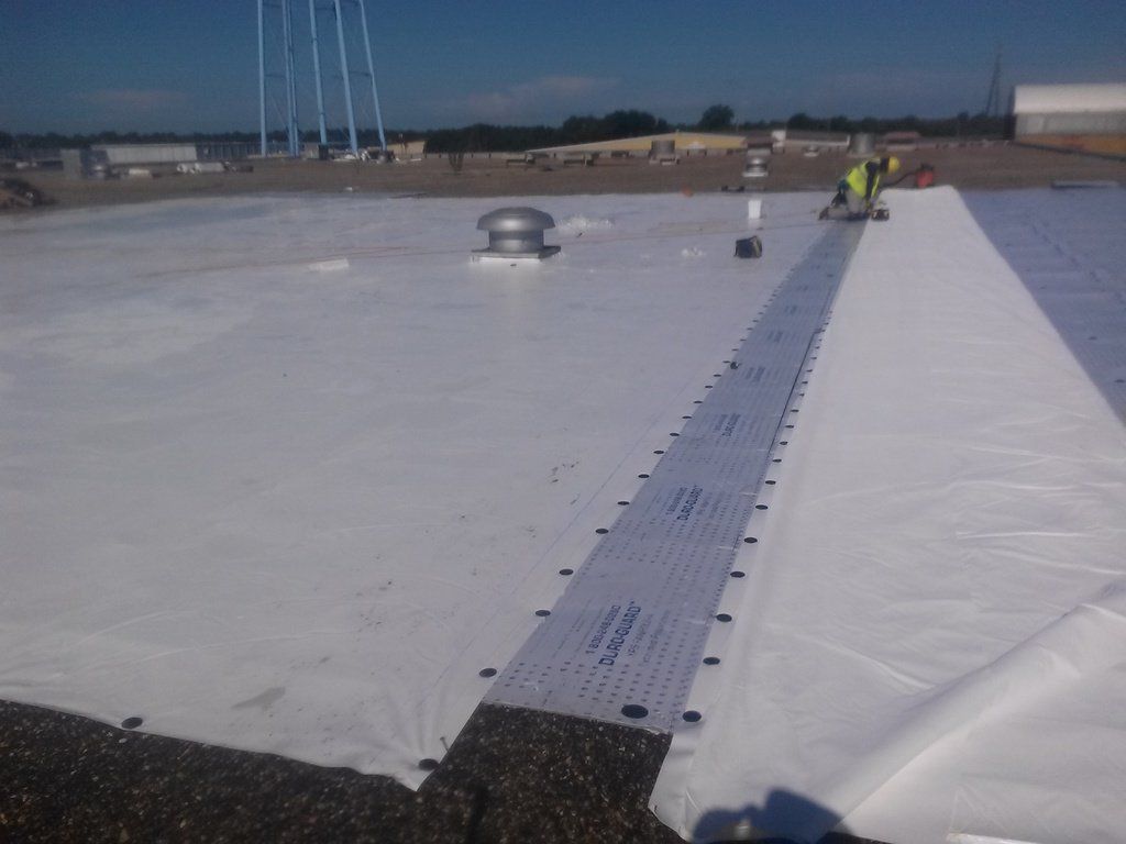 a white roof with a drain on it