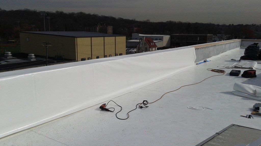 a white roof with a rope attached to it .