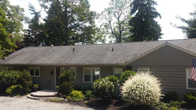 a house with an american flag on the front of it