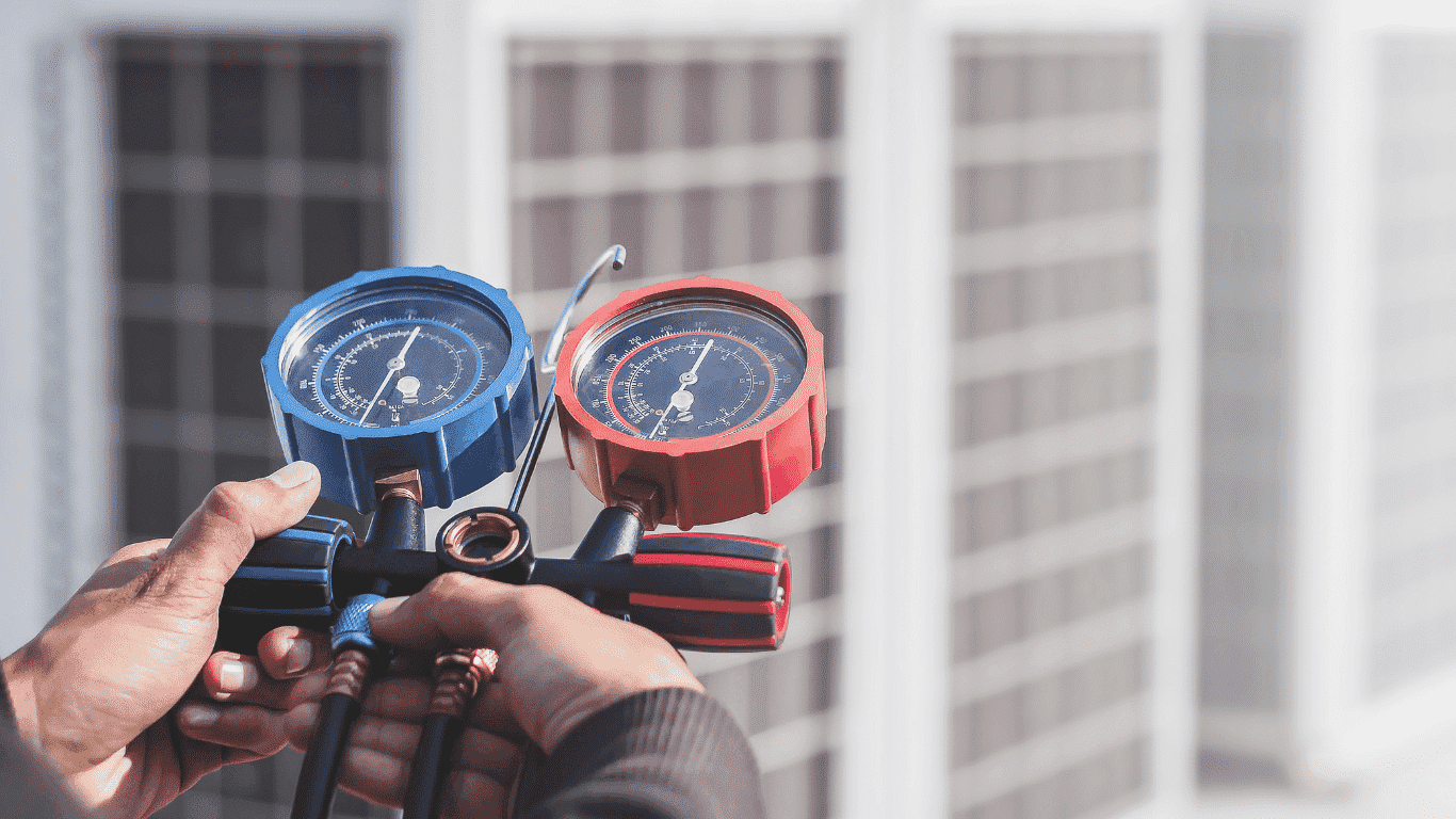 technician gauging heating and cooling temperature