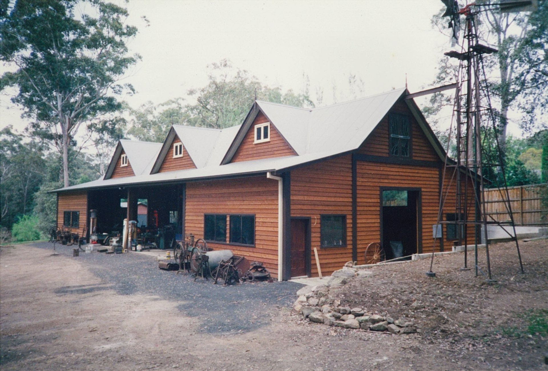 Wooden Building With Three Gabled Roofs — Boyne Building & Renovations in Wellington, NSW