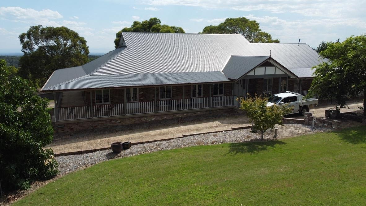 Large, Modern House With a Metal Roof — Boyne Building & Renovations in Ponto, NSW