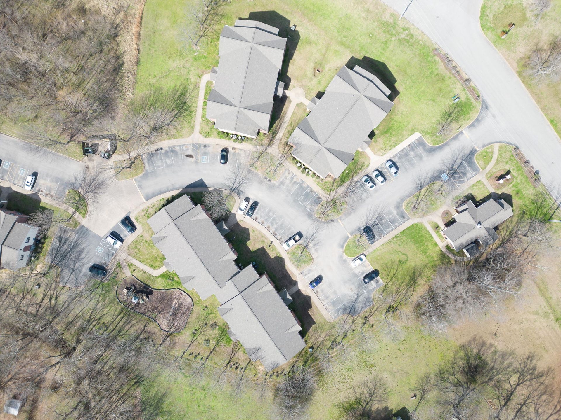 An aerial view of a residential area with a lot of houses