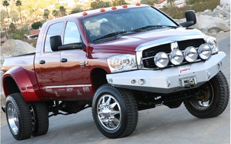 A red truck with a bumper that says f31 on it