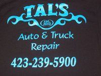 The logo for tal 's auto and truck repair is on a black shirt.
