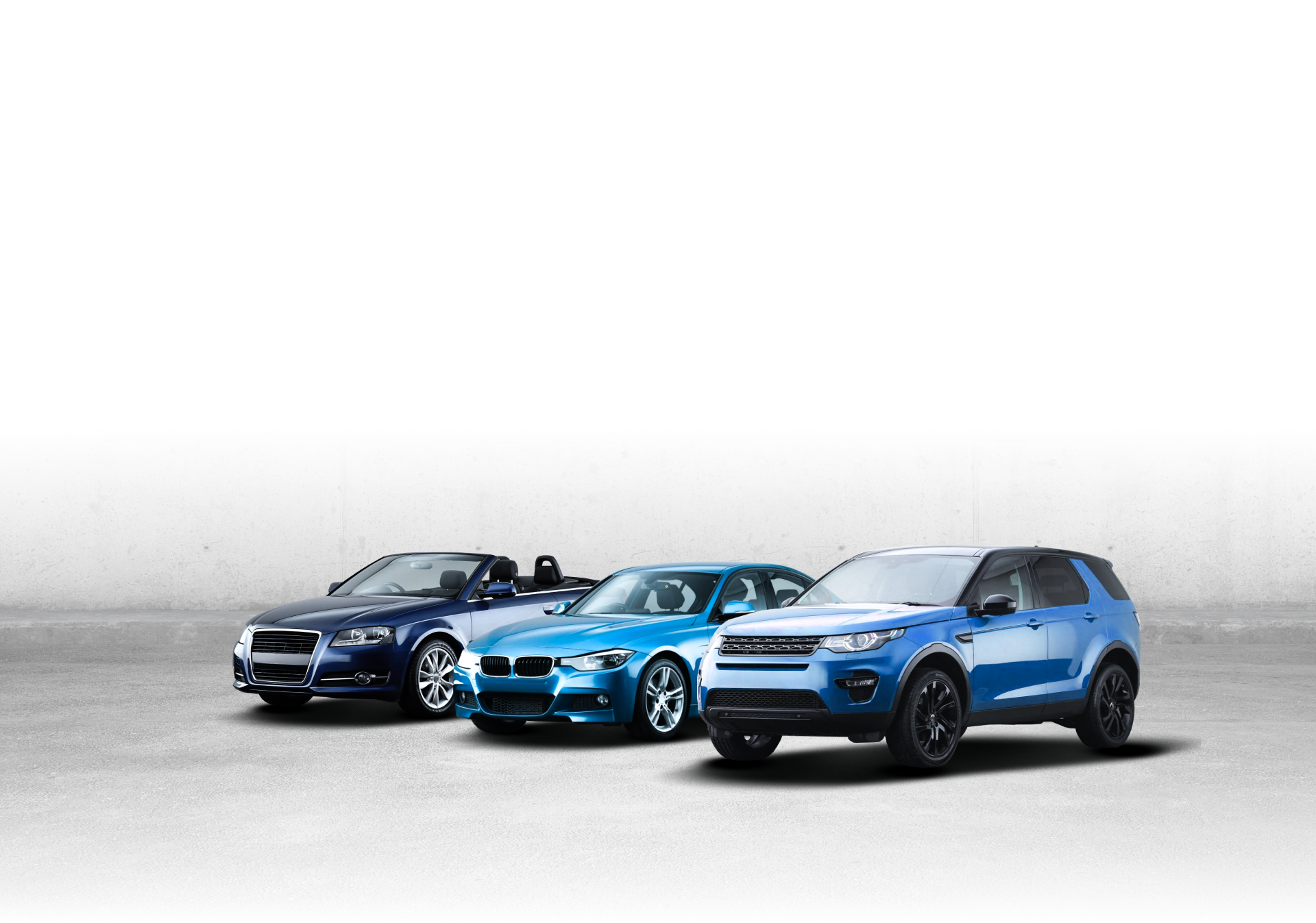 Three blue cars are parked next to each other on a white background. | Action Service Center