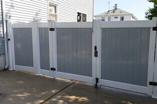 White and Gray Metal Fence — Fence & Gate Specialist in Staten Island, NY