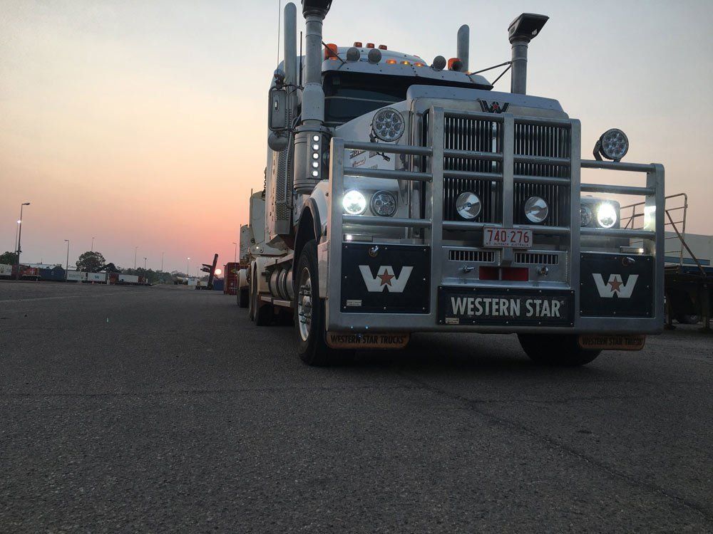 Silver Western Star Semi-Truck in A Parking Lot — Central Australian Sidelifter Haulage in Ciccone, NT