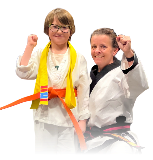 Man pointing, smiling, wearing black hoodie; arm tattoo visible.