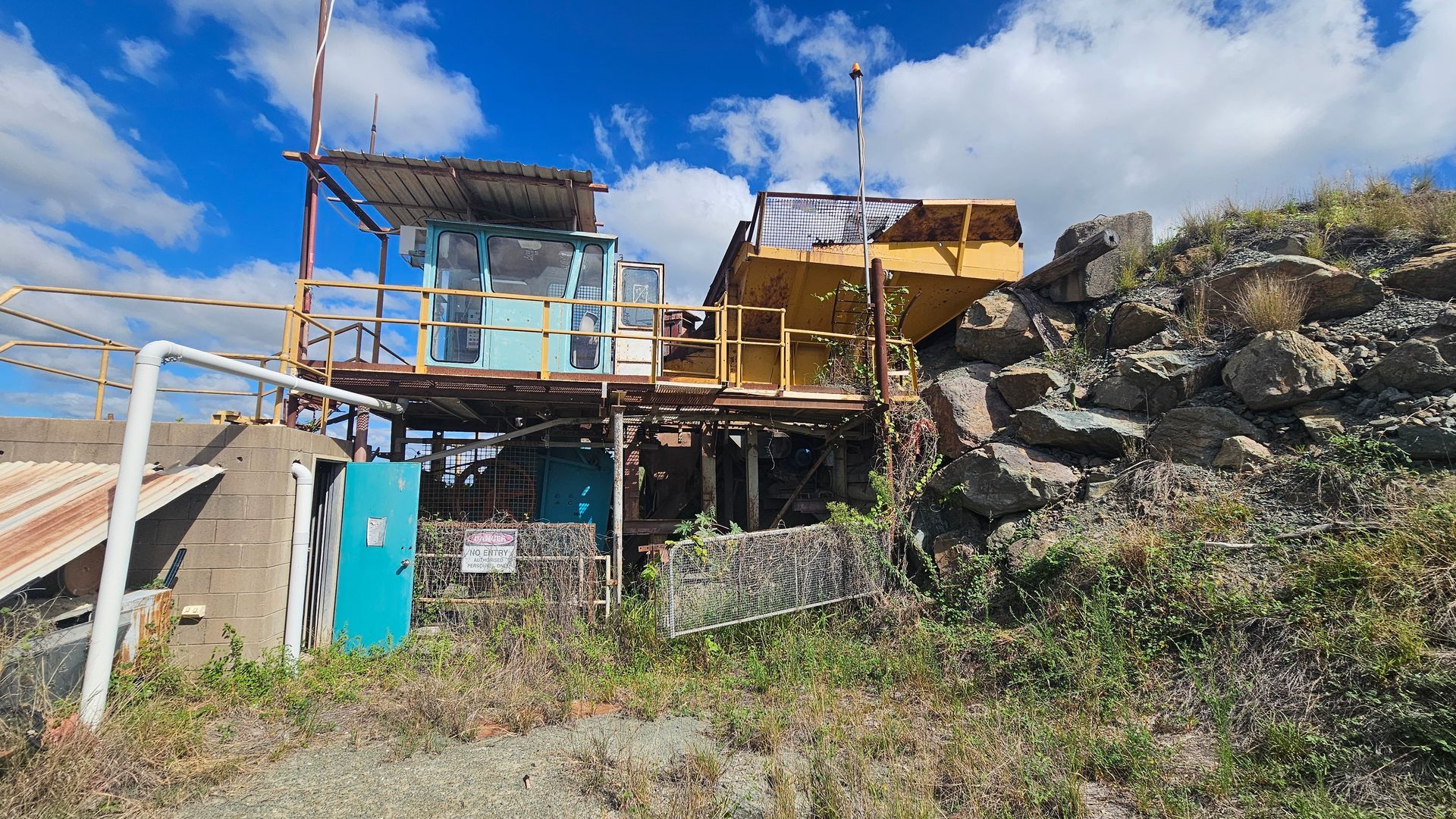 Yellow Hyundai Excavator With a Grapple Attachment — NPX Solutions In Rockhampton City, QLD
