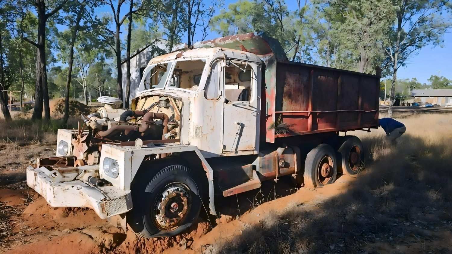 Weathered, Abandoned Dump Truck With a Rusted Bed — NPX Solutions In Rockhampton City, QLD