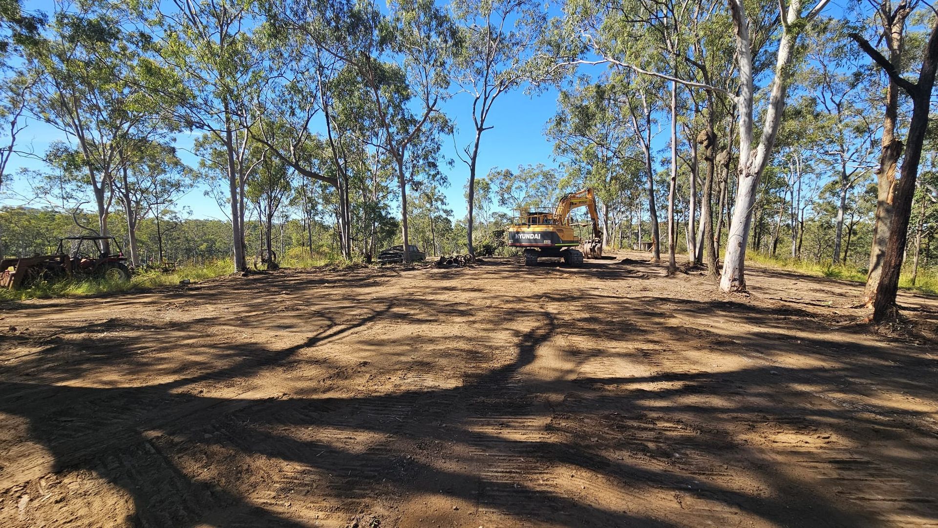 Blue Dumpster Overflowing With Construction Debris: Wood, Cardboard, and Plastic — NPX Solutions In Rockhampton City, QLD