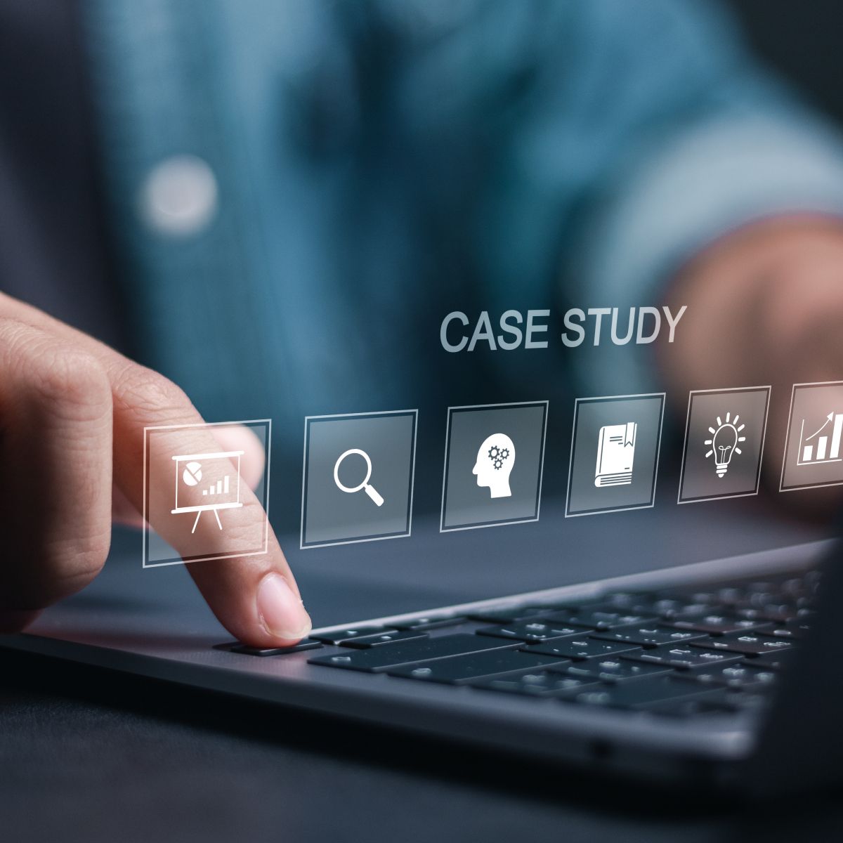 A person is typing on a laptop with the words case study on the screen
