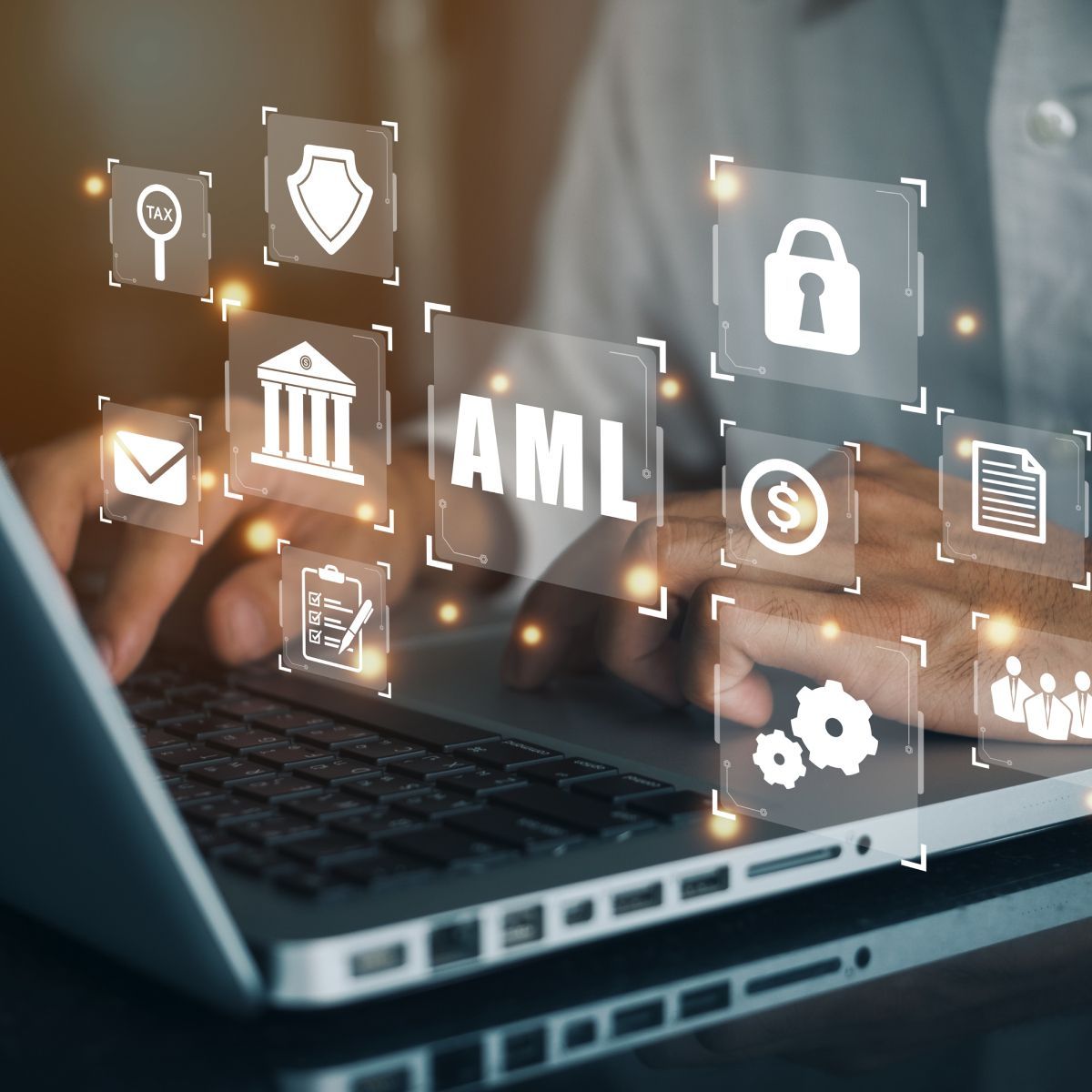 A person is typing on a laptop computer with a screen that says aml