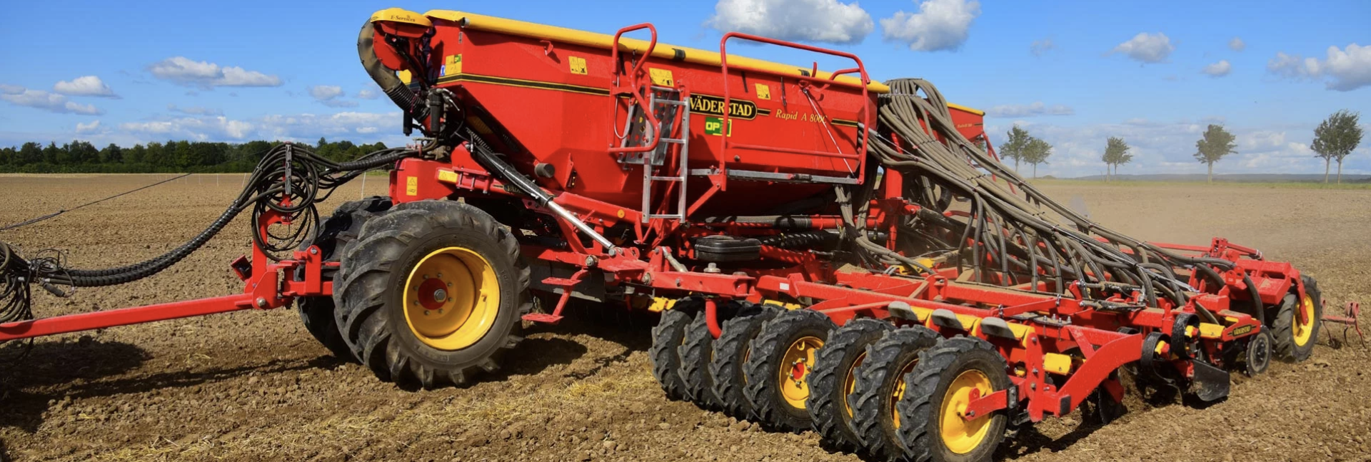 Modern Red Tractor Seeding Directly Into The Stubble With Red Equipment — O'Brien's Machinery In Hunter Valley NSW