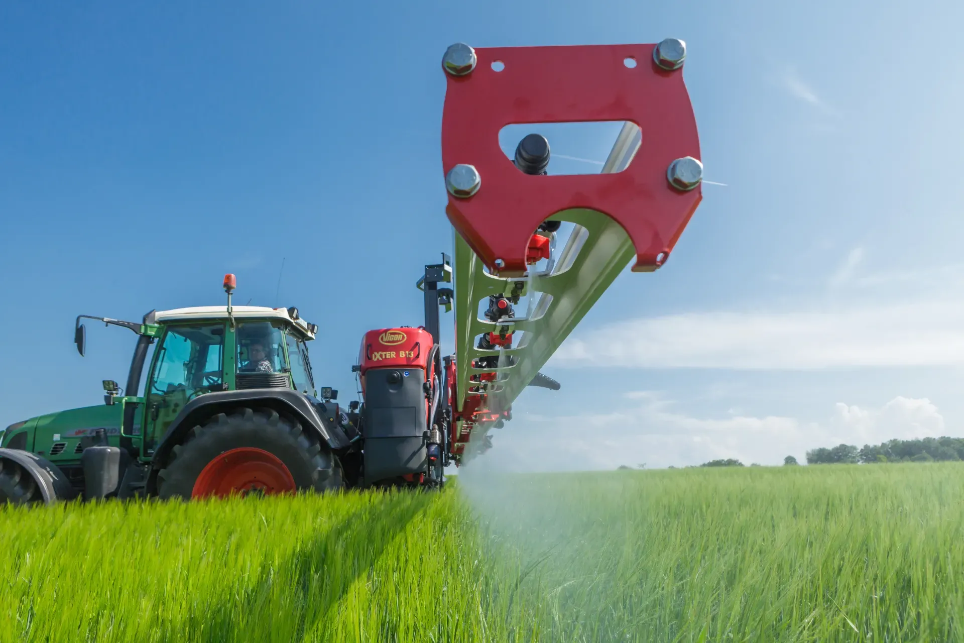 Red Tractor Preparing Farmland — O'Brien's Machinery In Taree