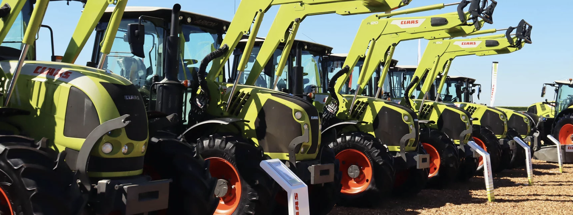 Tractor And Trailer In A Harvested Rapeseed Field — O'Brien's Machinery In Hunter Valley NSW
