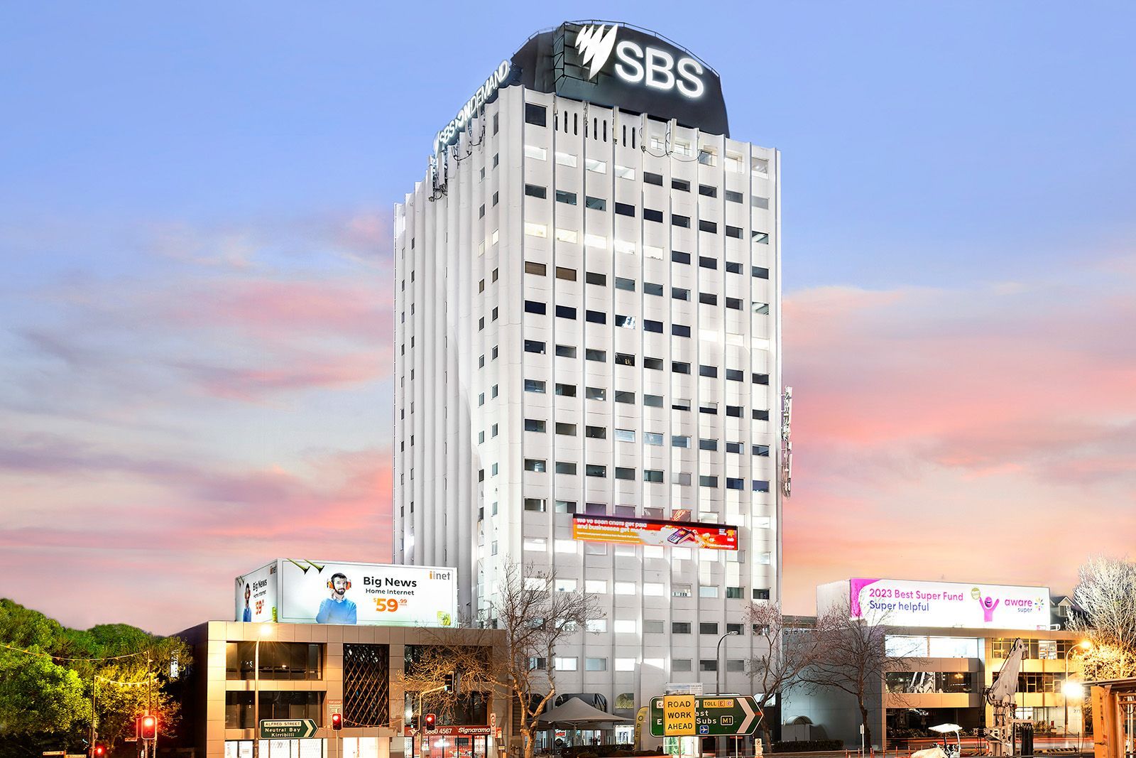 A large white building with the word sbs on top of it.