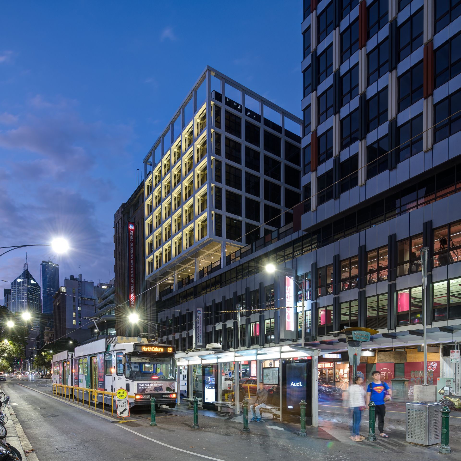 A city street with a bus 