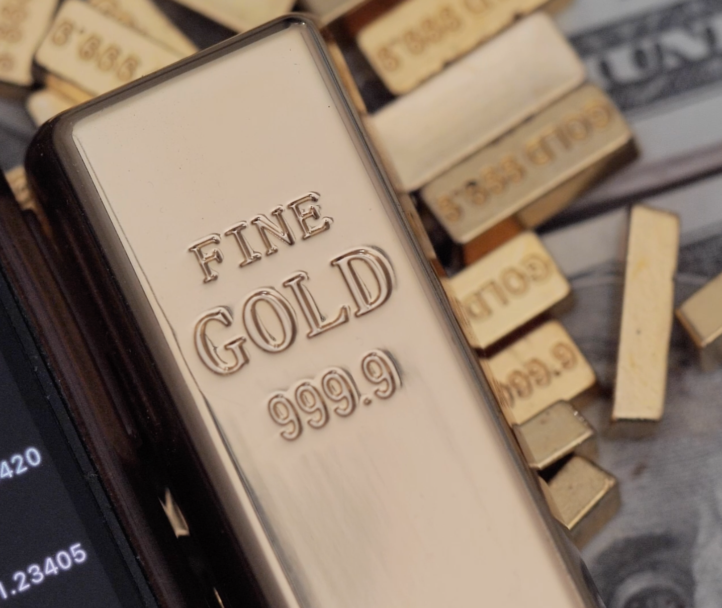 A close up of a gold bar that says fine gold 999.9