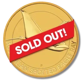 A gold coin that says sold out on it
