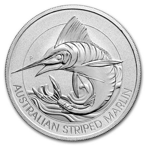 A silver coin with a marlin on it.