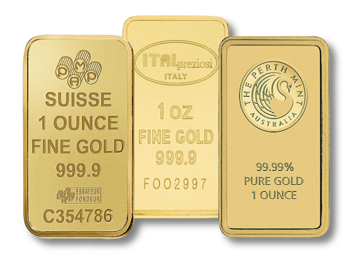 Three gold bars are sitting next to each other on a white surface.